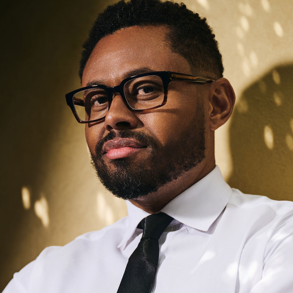 Portrait of Terence Keel with glasses and beard